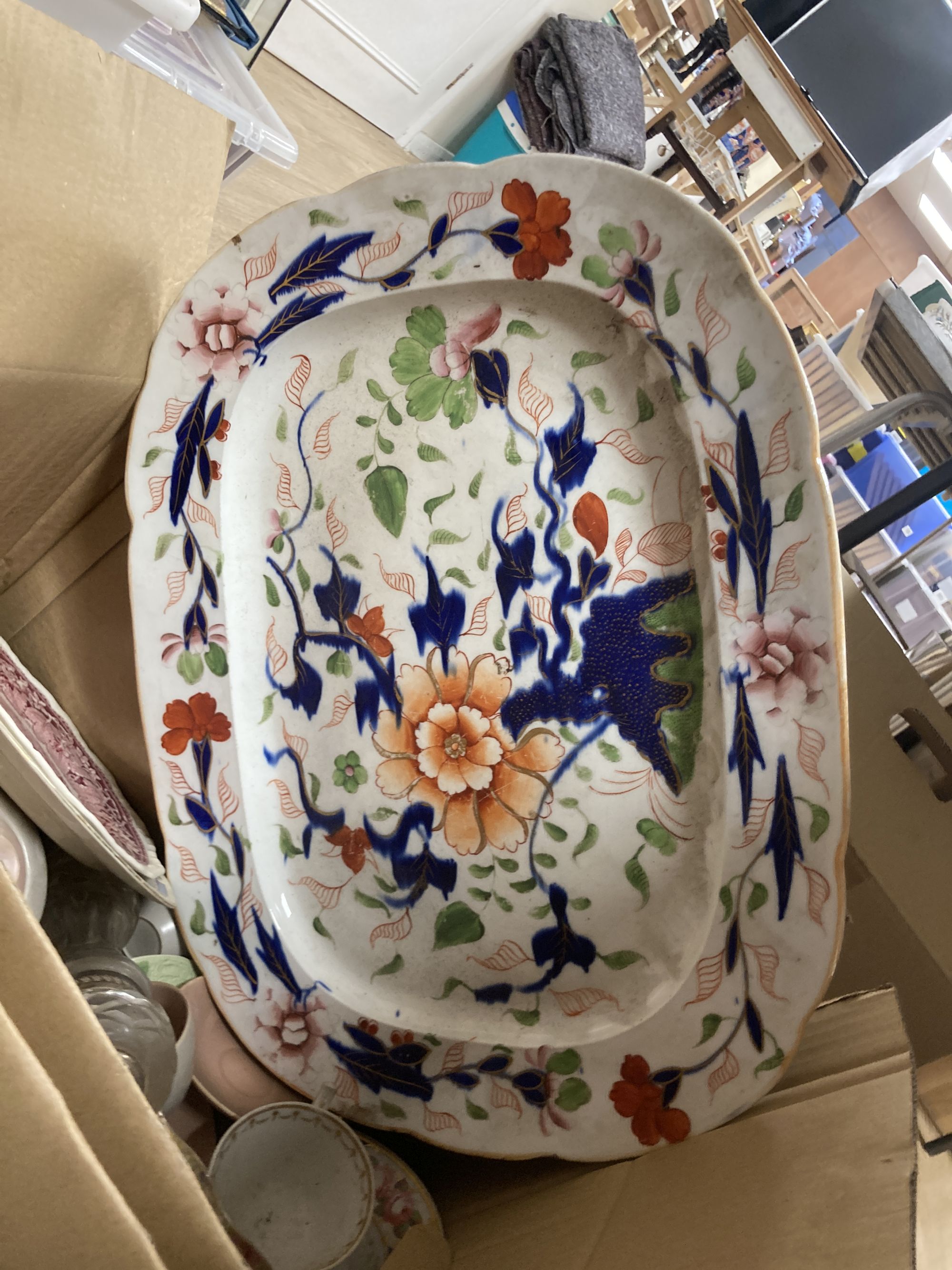 An early 19th century Staffordshire pottery part dinner service, including a large meat dish